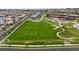 A vibrant neighborhood with lush green spaces, a community school, and well-maintained sports fields, ideal for families at 16256 Ute Peak Way, Broomfield, CO 80023