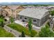Inviting backyard featuring a patio, well-manicured lawn, garden, and mountain views at 16256 Ute Peak Way, Broomfield, CO 80023