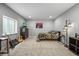 Bedroom with a twin bed, carpet, natural light, neutral walls, and cozy decor at 16256 Ute Peak Way, Broomfield, CO 80023