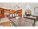 Combination of a modern kitchen and a bright dining room at 2069 Garrison St, Lakewood, CO 80215