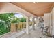 Inviting front porch with comfortable seating and elegant decor at 2069 Garrison St, Lakewood, CO 80215