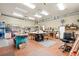 Well-equipped garage featuring ample workspace, organized tools, and functional layout at 2069 Garrison St, Lakewood, CO 80215