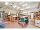 Bright workshop space with multiple worktables, shelving, and tool storage solutions at 2069 Garrison St, Lakewood, CO 80215