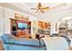 Spacious living room with a built-in entertainment center and hardwood floors at 2069 Garrison St, Lakewood, CO 80215