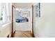 View of the main bedroom with a bed, a ceiling fan and a window with white curtains at 2069 Garrison St, Lakewood, CO 80215