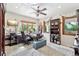 Bright office features a large window, custom built-ins, and a cozy atmosphere at 2069 Garrison St, Lakewood, CO 80215