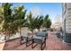 Inviting patio area featuring modern outdoor seating, ideal for relaxing or entertaining guests at 111 S Monroe St # B104, Denver, CO 80209