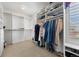 Spacious walk-in closet with ample shelving and hanging space for organized storage and convenience at 404 Yarrow Pl, Castle Pines, CO 80108