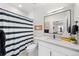 Full bathroom with a vanity, toilet and a shower with nautical themed curtain at 15322 Irving Ct, Broomfield, CO 80023
