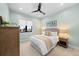 Comfortable bedroom with soft lighting, calming decor, and a view of the outside at 15322 Irving Ct, Broomfield, CO 80023