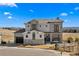 Inviting home exterior with a manicured lawn, stone accents, covered porch, and attached garage at 15322 Irving Ct, Broomfield, CO 80023