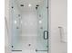 Detailed shot of the walk-in shower with a glass enclosure and dual shower heads at 15322 Irving Ct, Broomfield, CO 80023
