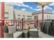 Relaxing balcony with seating and a grill, perfect for outdoor entertaining at 1767 N Pearl St # 308, Denver, CO 80203