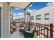 Cozy balcony features outdoor seating and city views at 1767 N Pearl St # 308, Denver, CO 80203