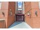Apartment building entrance with gate at 1767 N Pearl St # 308, Denver, CO 80203