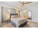 Calm main bedroom featuring stylish furnishings, decorative lighting, and an en suite bath at 1767 N Pearl St # 308, Denver, CO 80203