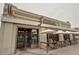 Inviting restaurant exterior with 'Take Out' signage and outdoor patio seating at 1767 N Pearl St # 308, Denver, CO 80203