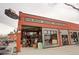 Brick building with a market advertising 'Fine Meats, Seafood, and Fresh Produce' at 1767 N Pearl St # 308, Denver, CO 80203