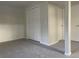 Finished basement room with grey carpet and closet at 3062 S Florence Ct, Denver, CO 80231