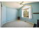 Light and airy bedroom with vaulted ceilings, a ceiling fan, and a large window at 19815 E Progress Ln, Centennial, CO 80015