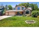 Charming two-story home with a well-manicured lawn and attached garage, perfect for suburban living at 19815 E Progress Ln, Centennial, CO 80015