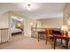 Open hallway with natural light and space for a convenient desk, adjacent to a bedroom at 19815 E Progress Ln, Centennial, CO 80015