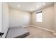 Bedroom with carpet, window and space to fit a small bed or seating area at 7150 E 121St Pl, Thornton, CO 80602