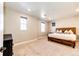Neutral bedroom with carpet, natural light, and a unique wood-framed bed at 7150 E 121St Pl, Thornton, CO 80602