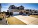 Stylish two-story home featuring stone accents, a two-car garage, and well-maintained landscaping at 7150 E 121St Pl, Thornton, CO 80602