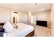 Spacious main bedroom featuring neutral colors, carpet, and a Mr&Mrs decorative sign at 7150 E 121St Pl, Thornton, CO 80602
