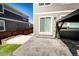 Back patio featuring a stamped concrete and access to the backyard and gazebo at 7150 E 121St Pl, Thornton, CO 80602