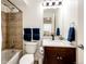 Basement bathroom with shower and granite vanity at 9381 Ashbury Cir # 102, Parker, CO 80134