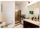 Updated bathroom with granite vanity and tub at 9381 Ashbury Cir # 102, Parker, CO 80134