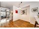 Bright dining area with hardwood floors and a chandelier at 9381 Ashbury Cir # 102, Parker, CO 80134