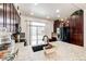 Spacious kitchen with granite countertops and stainless steel appliances at 9381 Ashbury Cir # 102, Parker, CO 80134