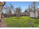 Well-maintained backyard featuring lush green grass and a storage shed, perfect for outdoor enjoyment at 6472 W Brittany Pl, Littleton, CO 80123