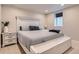 Basement bedroom with a queen bed and a night stand at 6472 W Brittany Pl, Littleton, CO 80123