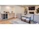 Living room with a bar area and a comfortable couch at 6472 W Brittany Pl, Littleton, CO 80123