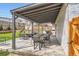 Outdoor patio with dining set, perfect for entertaining at 6472 W Brittany Pl, Littleton, CO 80123