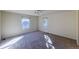 Bright bedroom with natural light from windows, ceiling fan and carpet at 870 Homestake Ct, Castle Rock, CO 80108