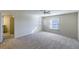 Large bedroom with neutral walls, carpet, and ample natural light from the windows at 870 Homestake Ct, Castle Rock, CO 80108