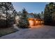 Beautiful two-story home featuring brick and siding exterior, attached garage and mature trees at 870 Homestake Ct, Castle Rock, CO 80108