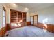 Spacious office featuring custom wood trim, built-in shelves, and a window for natural light at 870 Homestake Ct, Castle Rock, CO 80108
