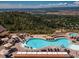 Luxury pool with mountain views and lounge chairs, perfect for relaxation at 870 Homestake Ct, Castle Rock, CO 80108