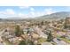 Sweeping aerial view showcases Golden, Colorado, with homes nestled against a mountain backdrop at 217 Ford St, Golden, CO 80403