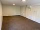 Spacious basement with carpeted floors and storage at 217 Ford St, Golden, CO 80403