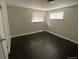 Empty bedroom with hardwood floors and a large window at 217 Ford St, Golden, CO 80403