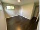 Bright bedroom featuring hardwood floors and a sunlit window at 217 Ford St, Golden, CO 80403
