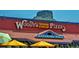 Woody's Wood Fired Pizza restaurant with its colorful signage and awnings at 217 Ford St, Golden, CO 80403