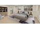 Spacious bedroom features neutral tones, a walk-in closet, and a large window at 9368 S Silent Hills Dr, Lone Tree, CO 80124